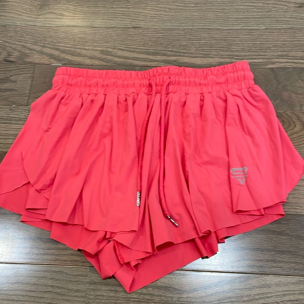 Hot pink flowwy shorts with tight shorts built inside